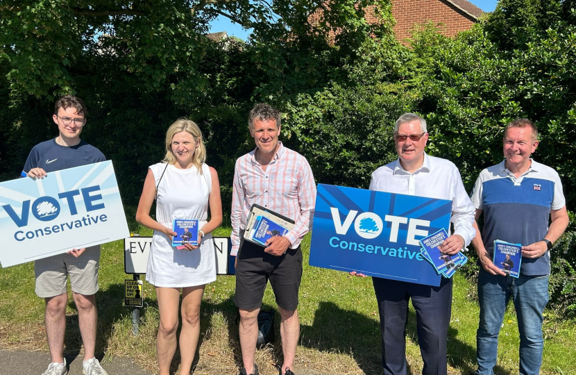 James canvassing with Roger Hirst and volunteers